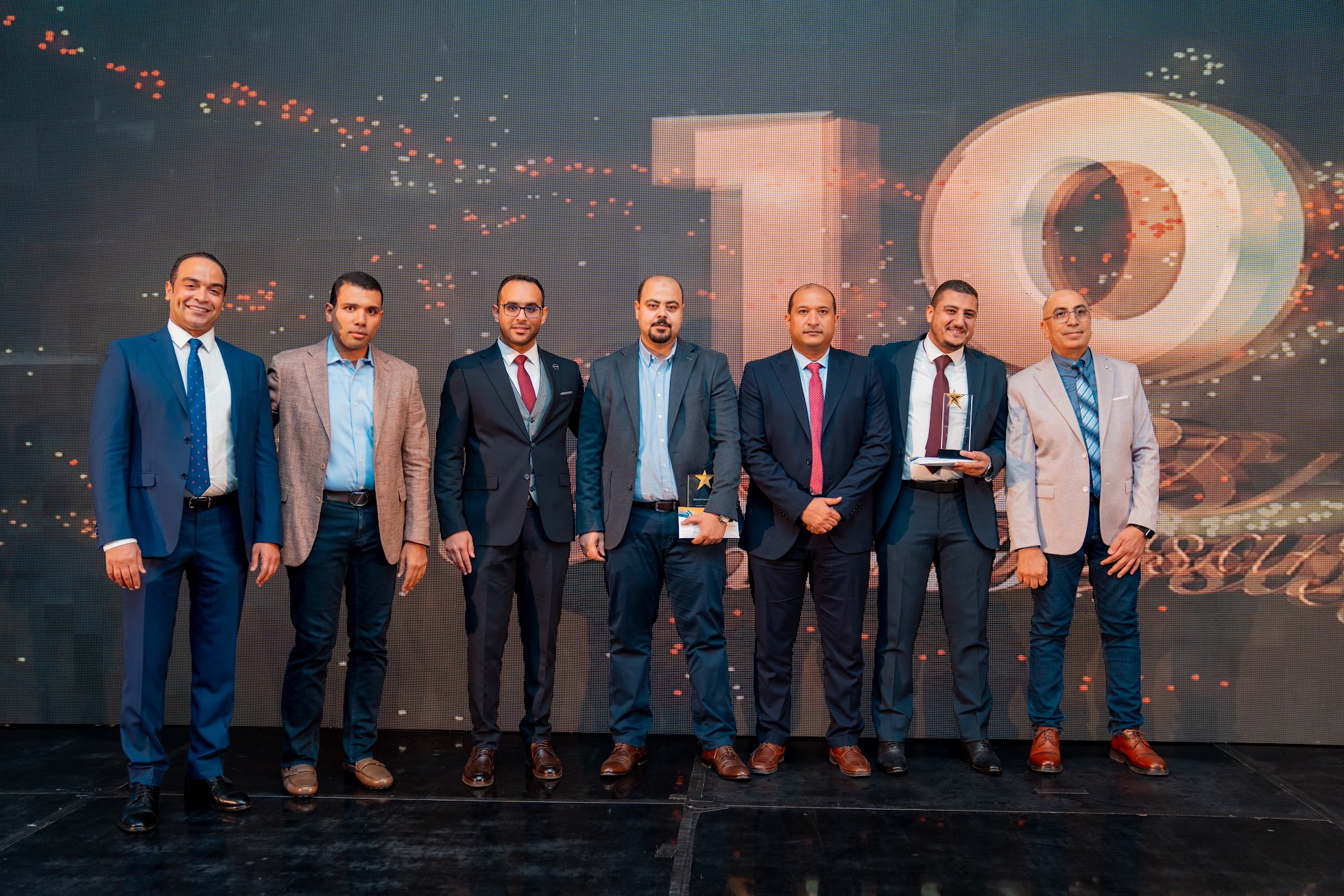 Professional group photo at event stage
