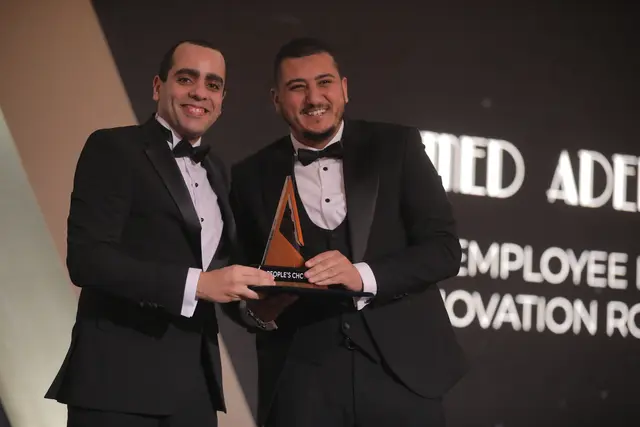 Receiving the innovation recognition on stage